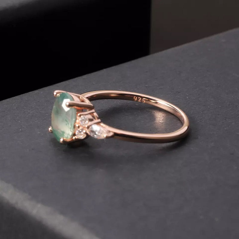 Moss Agate Oval Ring with 3 Stone Sides