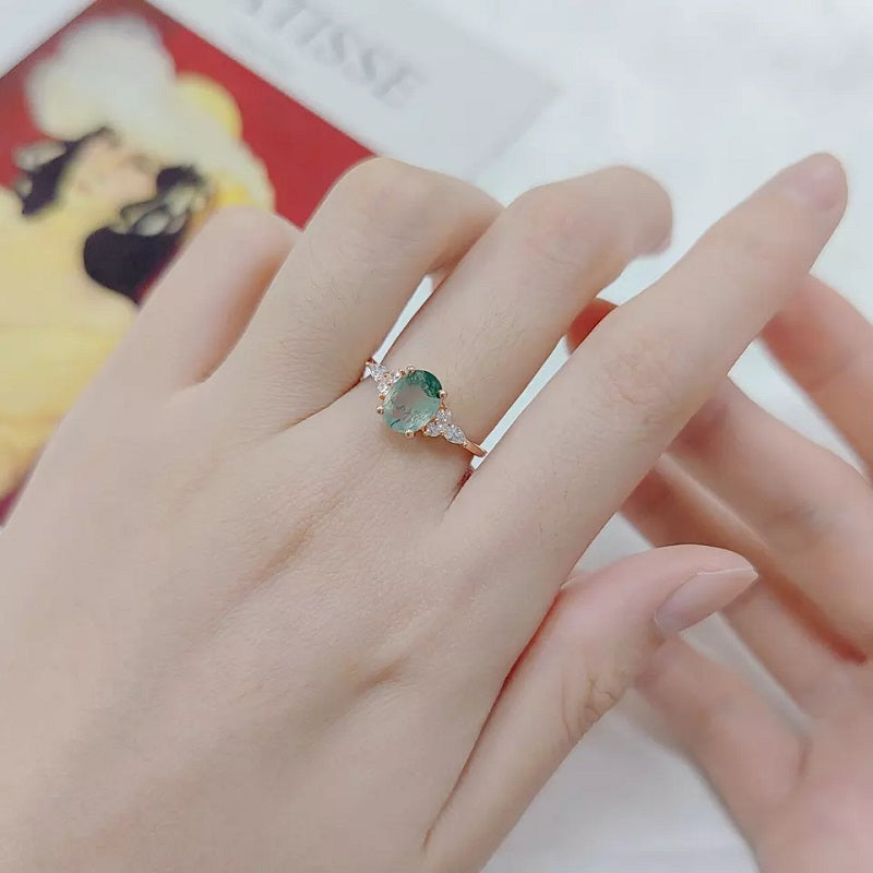 Moss Agate Oval Ring with 3 Stone Sides