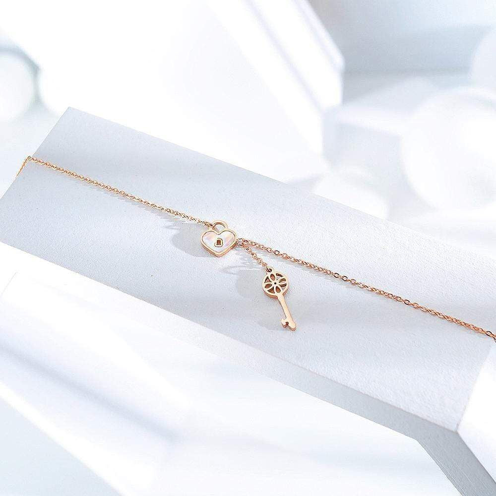 Lock and Key Pattern NecklaceGorgeous and timeless, this 18k rose gold necklace is designed with the delicate lock and key motif. With a subtle yet stylish look, this timeless piece is ideal forWomans Necklaces8006Dhia JewelleryKey Pattern Necklace