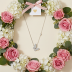 Butterfly Necklace Flat-Lay with Flowers