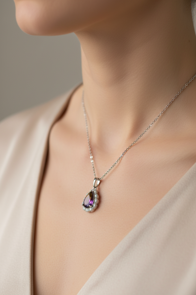 Model wearing purple-gold pendant