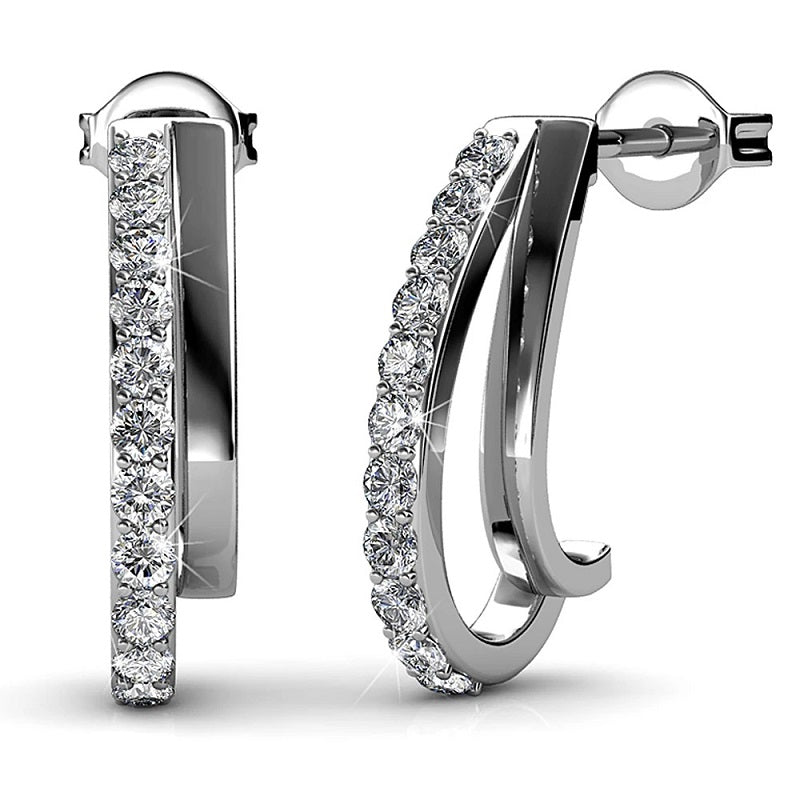 Moon Hoop EarringsDhia Moon Hoop Earrings Made Crystals From Swarovski
Beautify your ears with our Moon shaped drop earrings featuring genuine Crystals from Swarovski.
Features:– MateEarrings8002/8005Dhia JewelleryMoon Hoop Earrings
