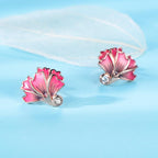 Elegant Carnation Stud Earrings in sterling silver with rose gold & Swarovski Zirconia. A timeless floral design, perfect for every occasion.