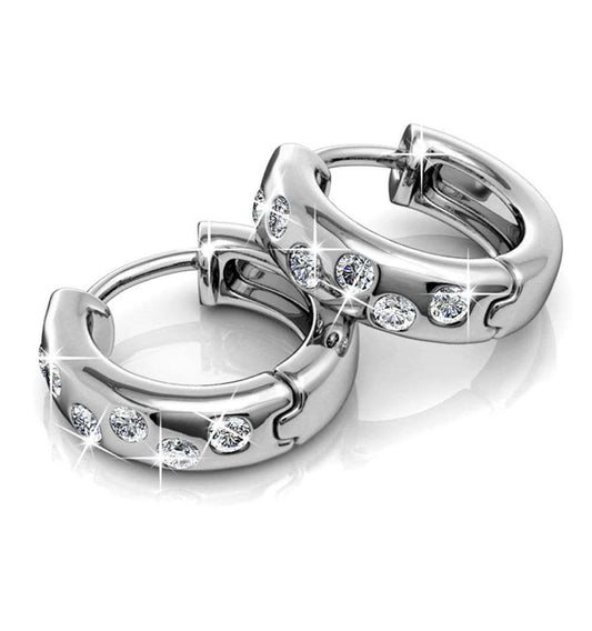 Exotic Hoop Earrings - SilverDescription
Adorned with Crystals from Swarovski, these earrings boast a simple, yet exquisite style. Each hoop showcases a total of 12 crystals. Crafted with 18K whDJ010Dhia JewelleryExotic Hoop Earrings - Silver