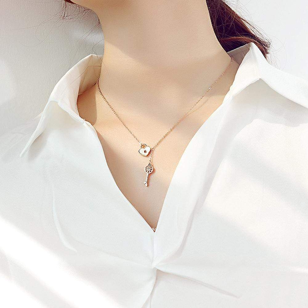 Lock and Key Pattern NecklaceGorgeous and timeless, this 18k rose gold necklace is designed with the delicate lock and key motif. With a subtle yet stylish look, this timeless piece is ideal forWomans Necklaces8006Dhia JewelleryKey Pattern Necklace