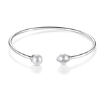 Dhia Pearl BanglesDhia Pearl Bangle In Sterling Silver embellished with Crystals From Swarovski
Crafted in Sterling Silver, this open cuff is embellished with two Swarovski White PearDJ001Dhia JewelleryDhia Pearl Bangles