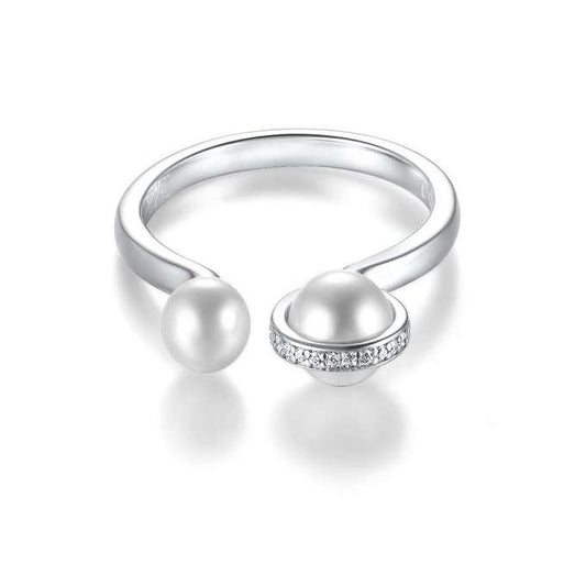 Dhia Pearl Ring
This modern and stylish ring is embellished with two Swarovski Pearl’s and decorated in a layer of Clear Crystals from Swarovski.
Category: RingMaterial: 925 SterliRingsDhia JewelleryDhia JewelleryDhia Pearl Ring